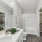 Bathroom with shower and tub combo connected to a closet