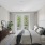 Bedroom with french doors to balcony