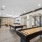 Upstairs clubroom with ample seating, a tv, kitchen and games 
