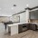 Upstairs clubroom with ample seating, a tv, kitchen and games 